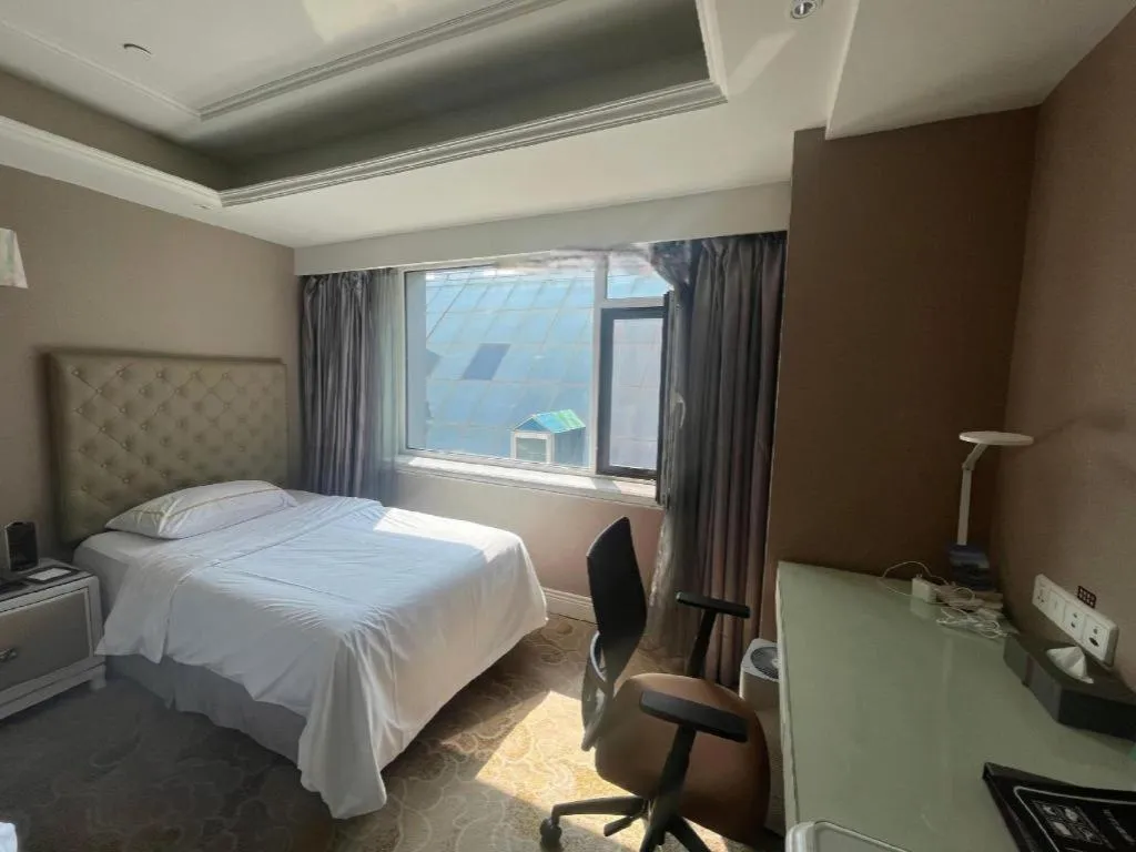 Bed in Yantai Bihai Hotel