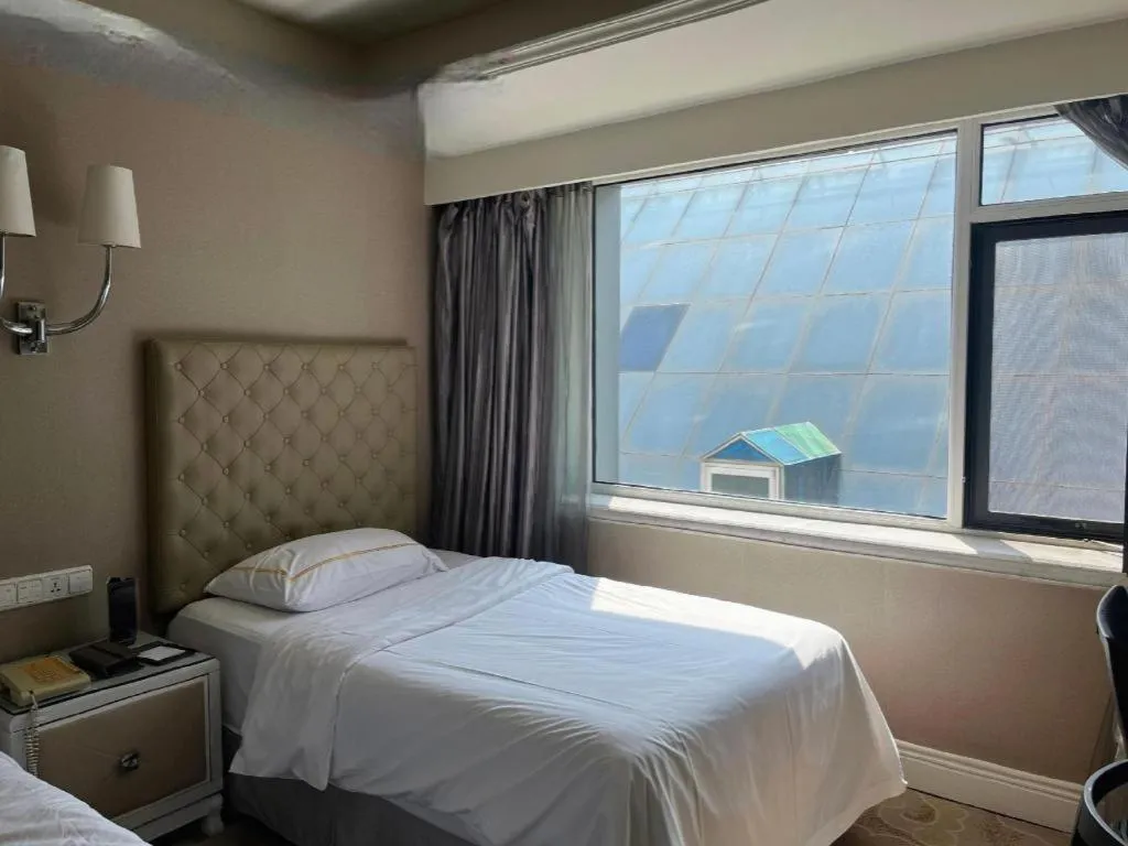 Bed in Yantai Bihai Hotel