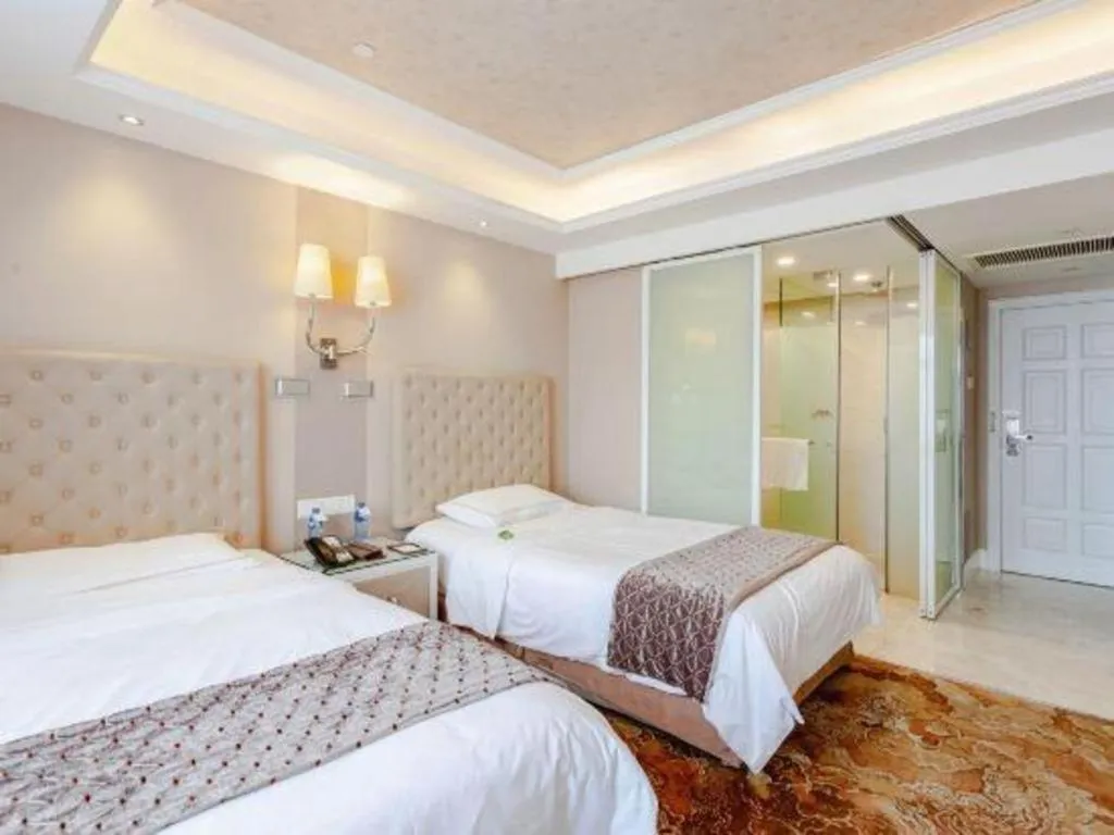 Bed in Yantai Bihai Hotel
