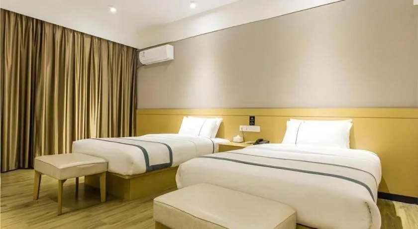 Bed in City Comfort Inn Liuzhou Liunan Wanda Plaza