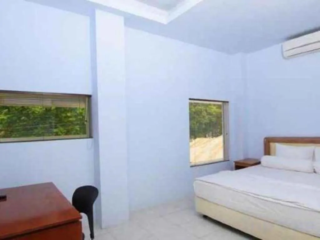 Bed in Hotel New Melati