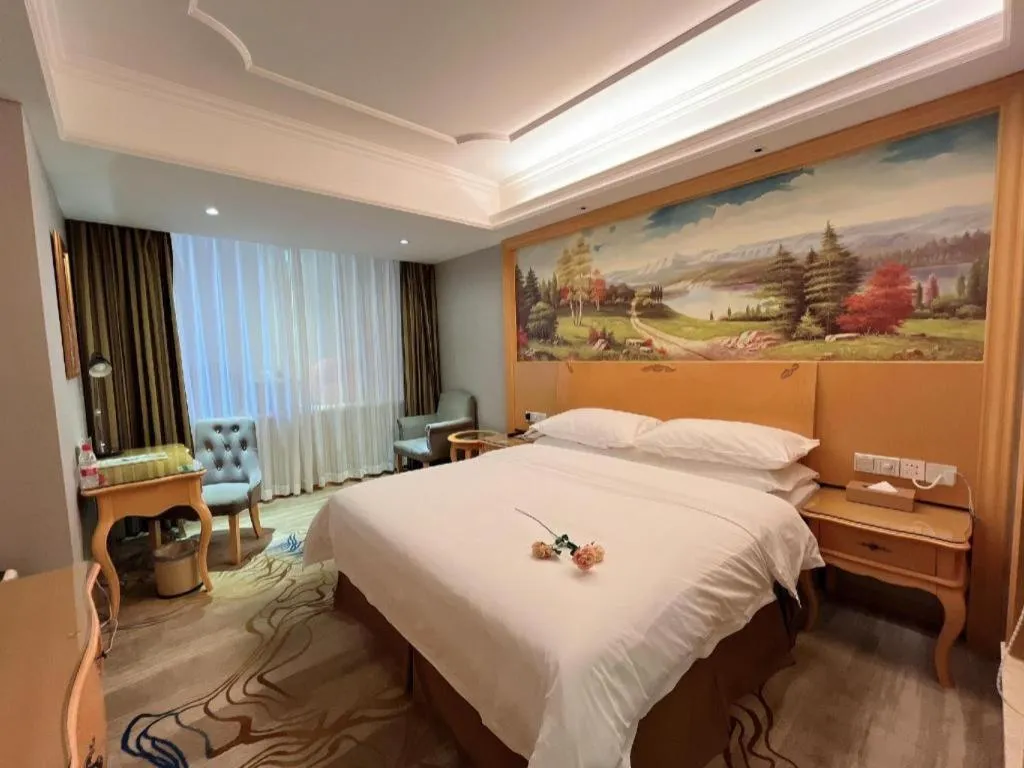 Bed in Vienna Hotel Shenzhen Longgang Dayun Center Branch