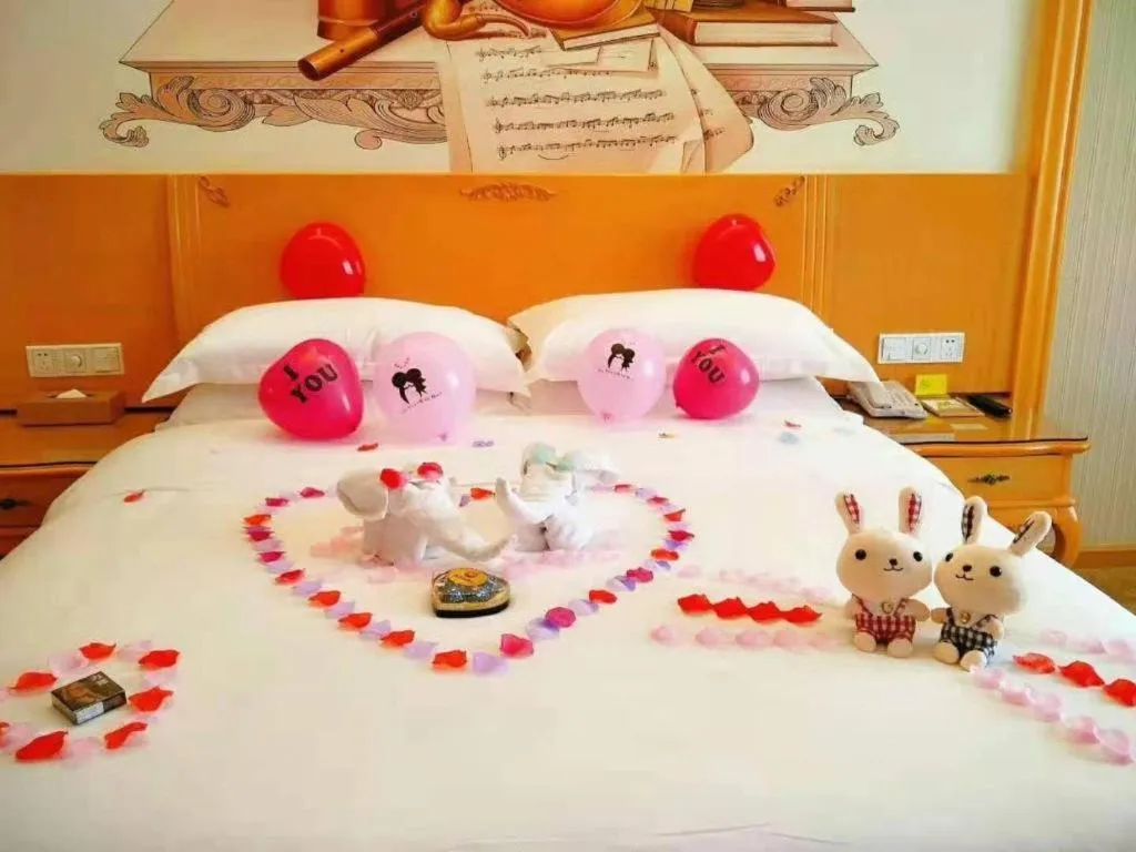 Bed in Vienna Hotel Shenzhen Longgang Dayun Center Branch