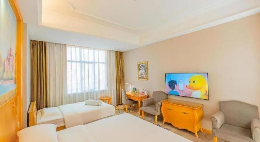 Bed in Vienna Hotel Shenzhen Longgang Dayun Center Branch