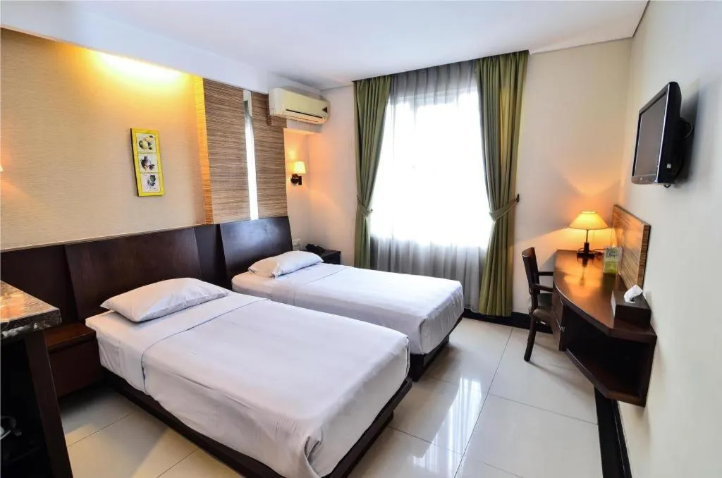 Bed in Losari Roxy Hotel Jakarta