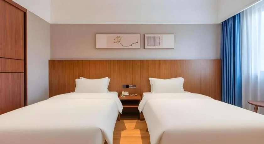 Bed in Carrianna Hotel