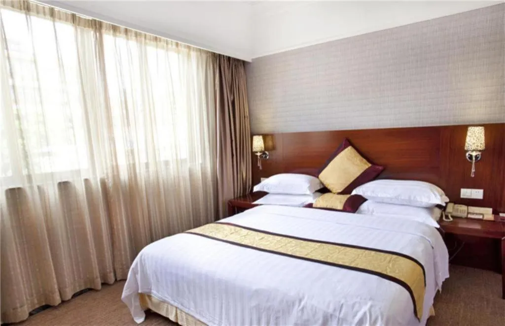 Bed in Carrianna Hotel