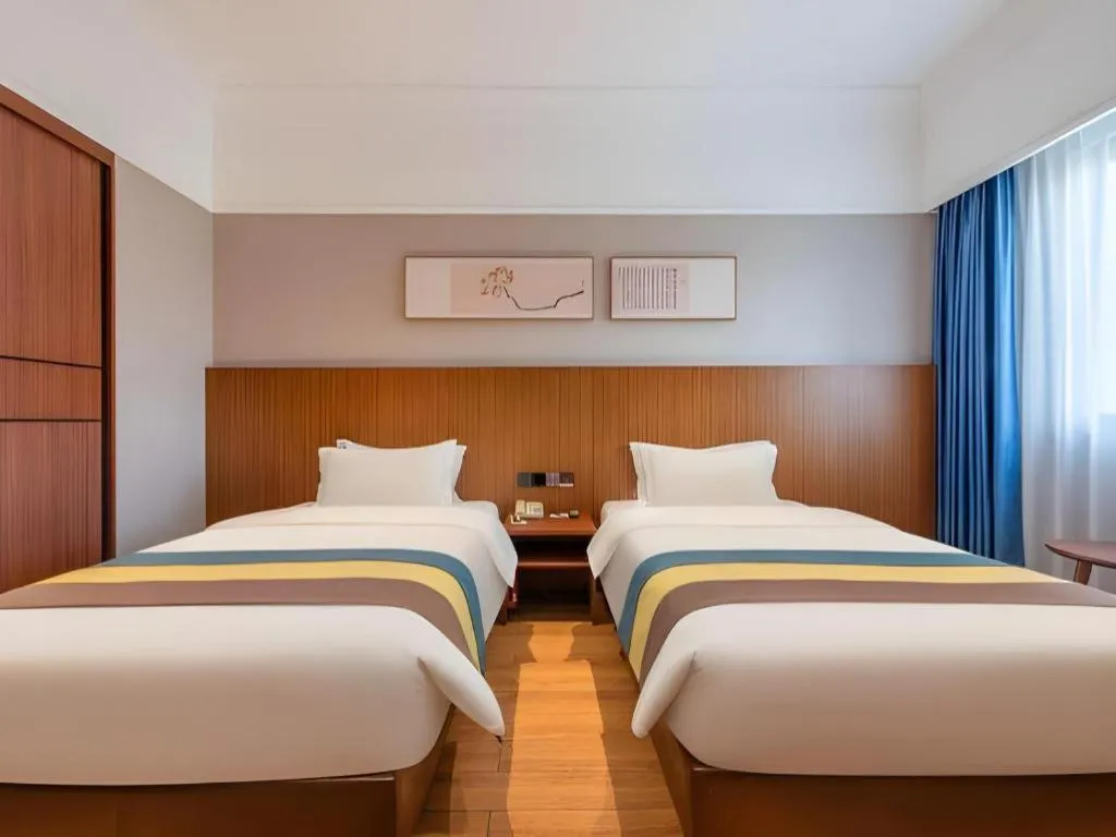 Bed in Carrianna Hotel