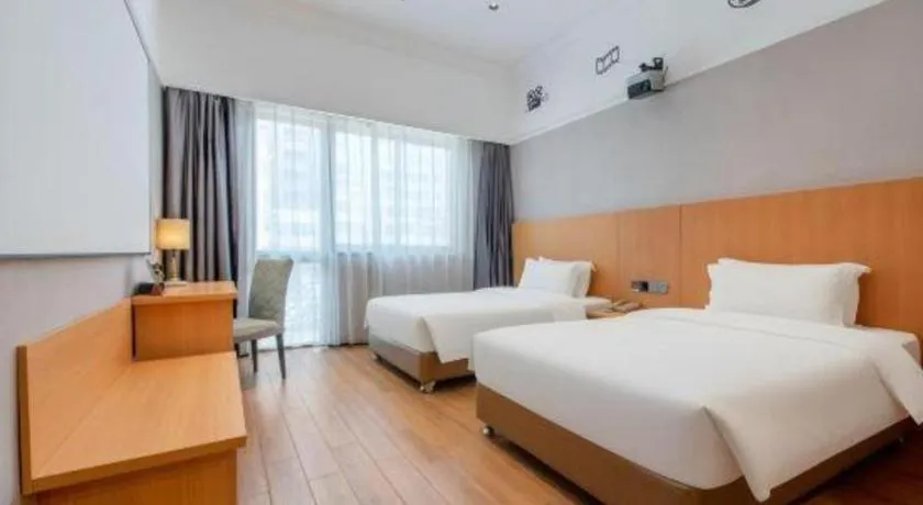 Bed in Carrianna Hotel