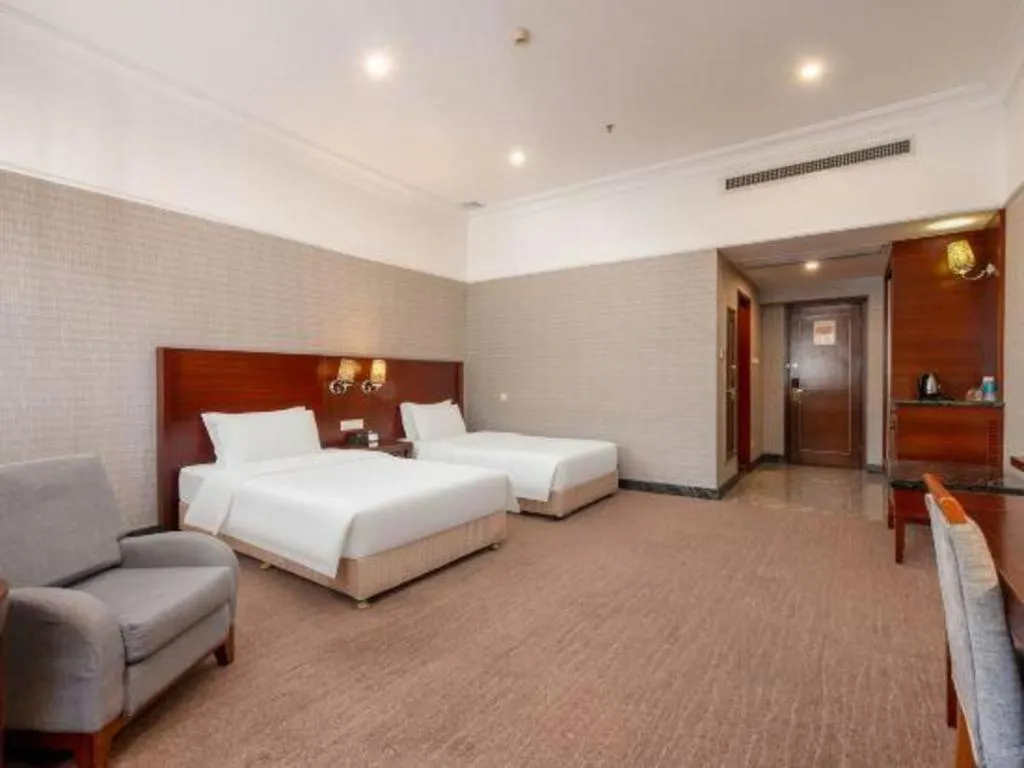 Bed in Carrianna Hotel