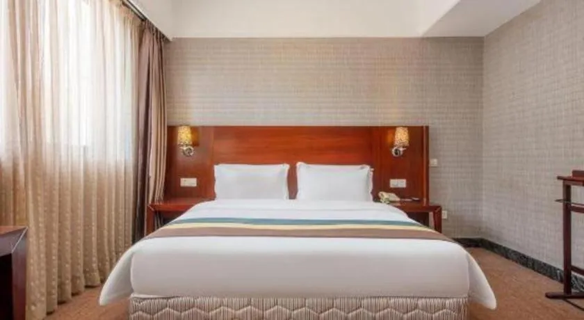 Bed in Carrianna Hotel