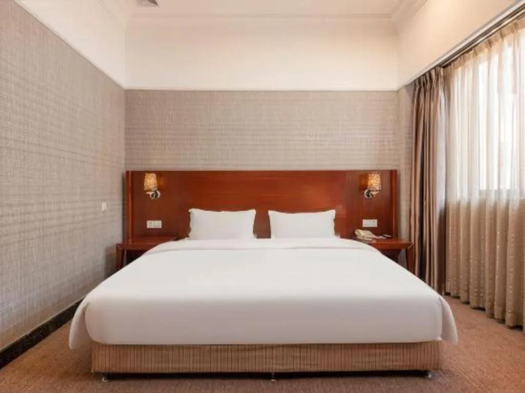 Bed in Carrianna Hotel