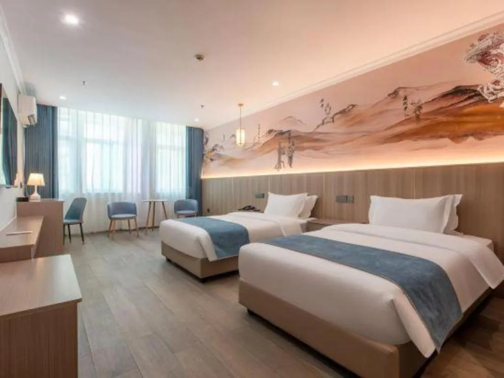 Bed in Carrianna Hotel