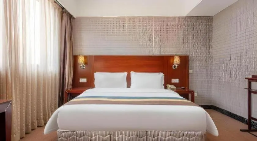 Bed in Carrianna Hotel