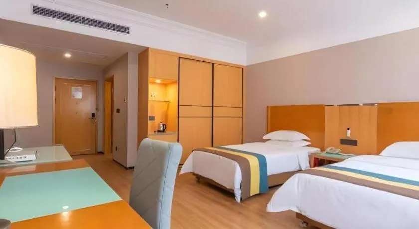 Bed in Carrianna Hotel