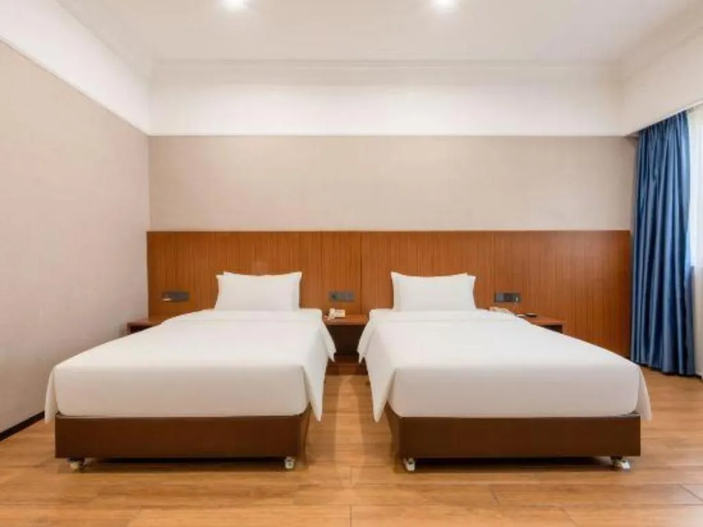 Bed in Carrianna Hotel