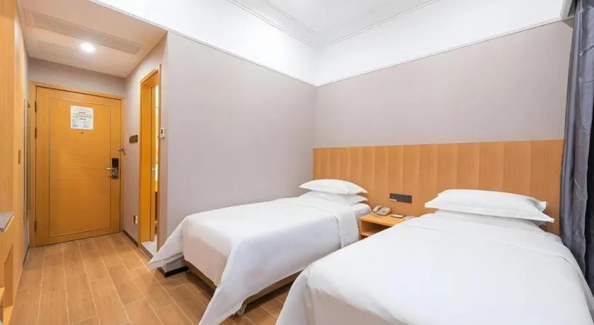 Bed in Carrianna Hotel