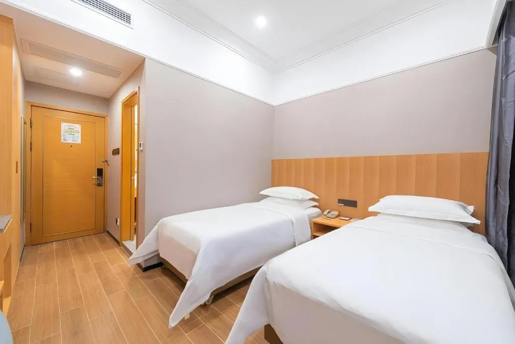 Bed in Carrianna Hotel