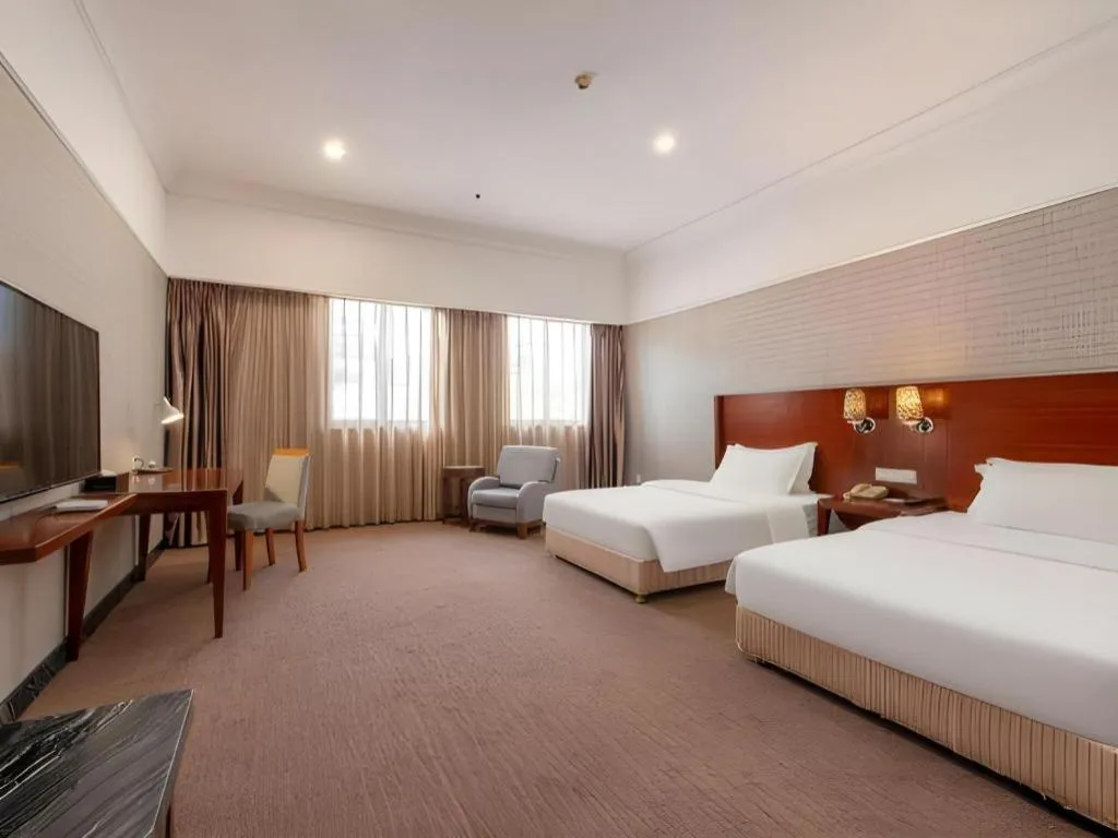 Bed in Carrianna Hotel