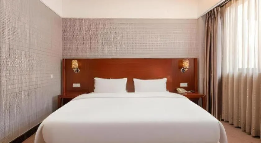 Bed in Carrianna Hotel