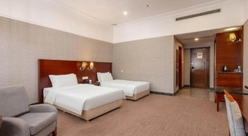 Bed in Carrianna Hotel