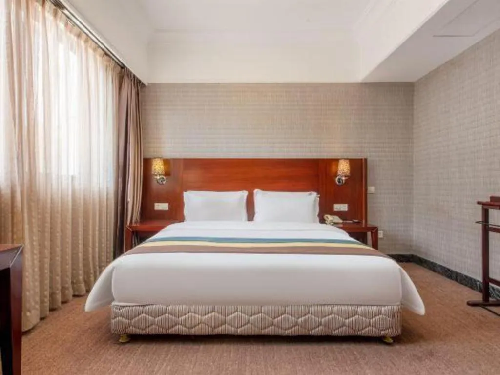 Bed in Carrianna Hotel