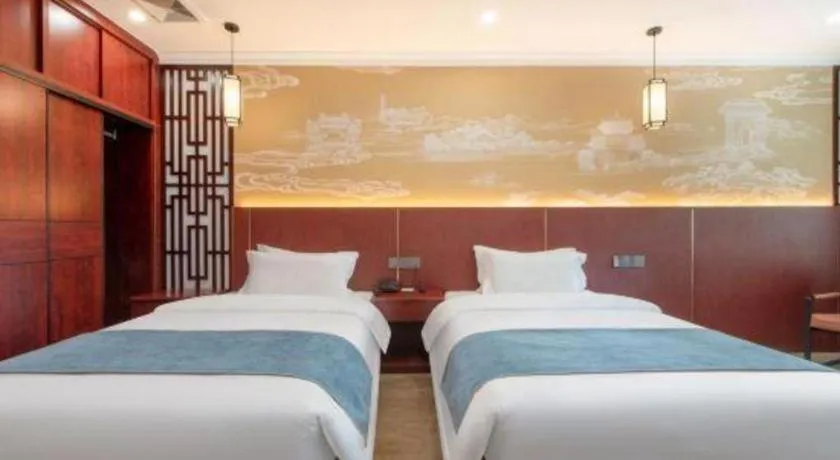 Bed in Carrianna Hotel