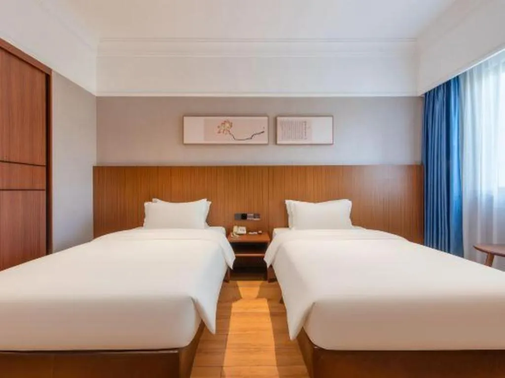 Bed in Carrianna Hotel