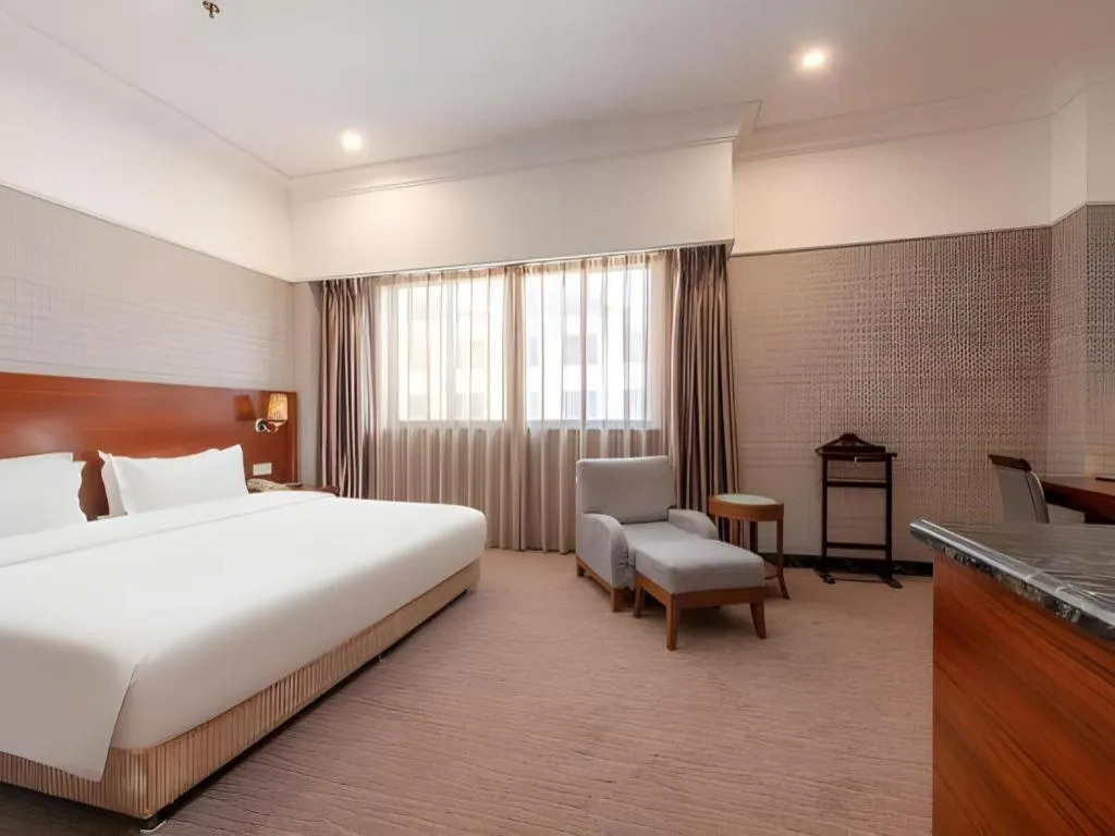 Bed in Carrianna Hotel