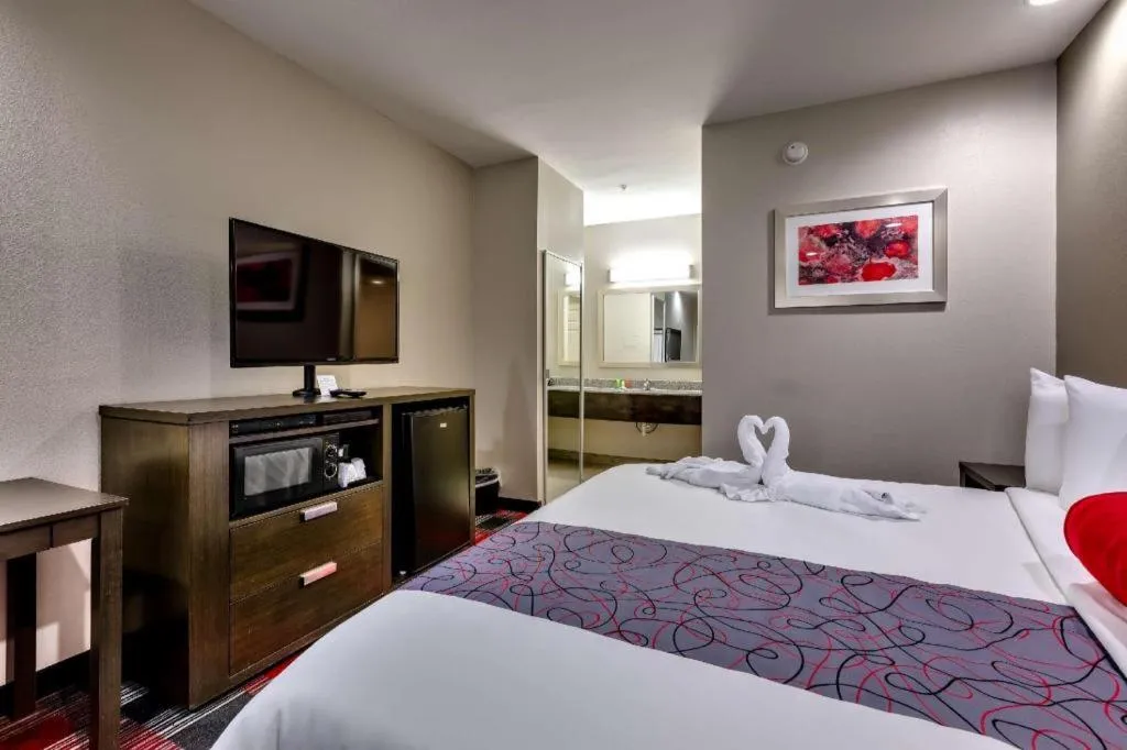Bed in Americas Best Value Inn and Suites IAH Airport North