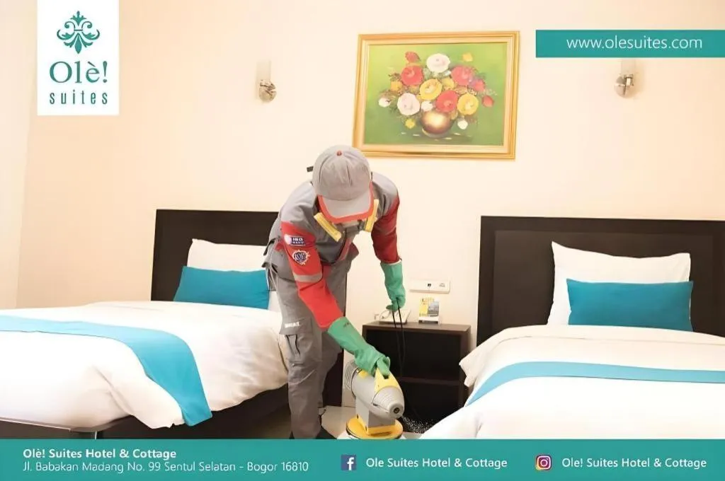 Bed in Ole Suite Hotel and Cottage