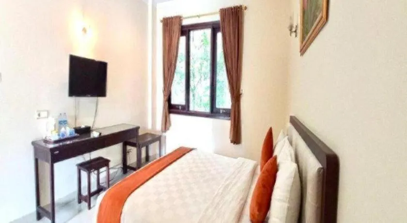 Bed in Ole Suite Hotel and Cottage