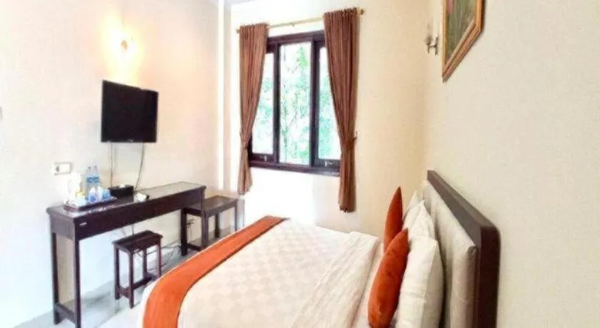 Bed in Ole Suite Hotel and Cottage