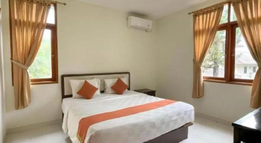 Bed in Ole Suite Hotel and Cottage