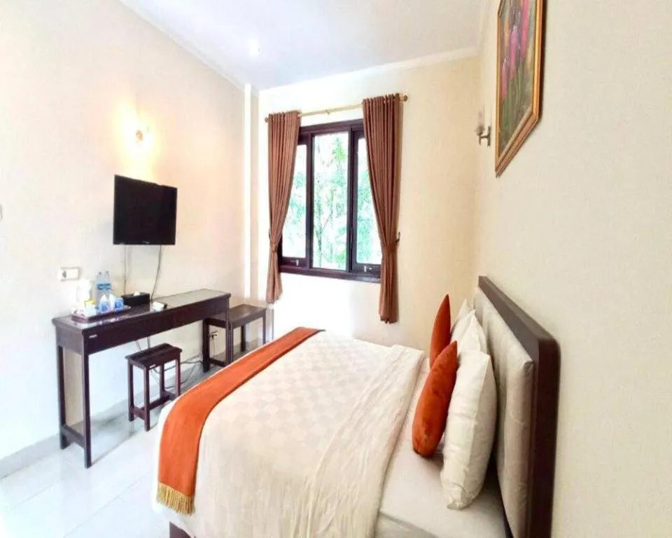 Bed in Ole Suite Hotel and Cottage