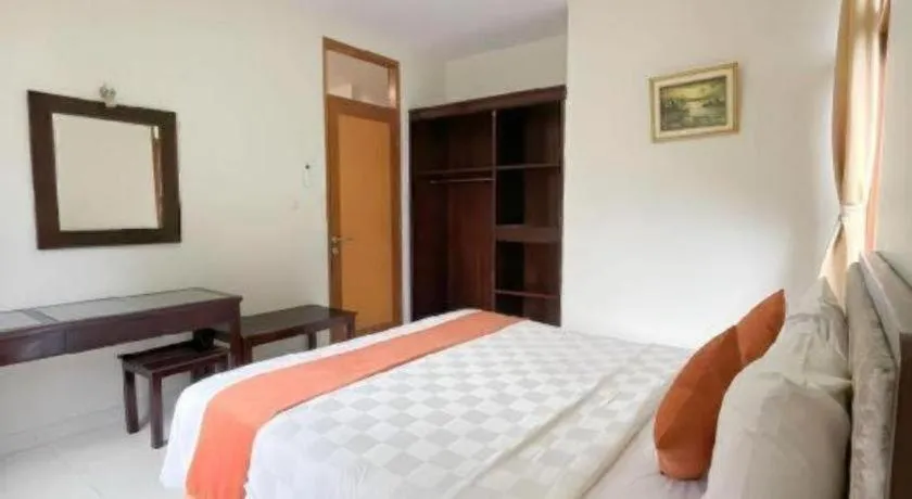 Bed in Ole Suite Hotel and Cottage