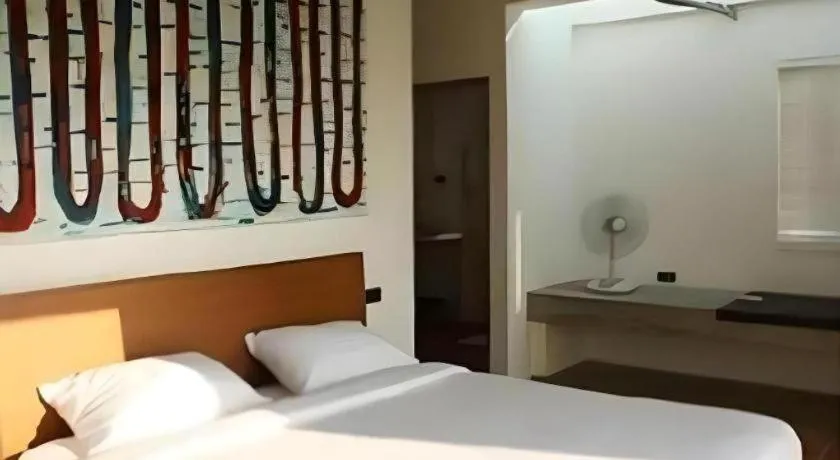 Bed in Lucerne Villa Resort