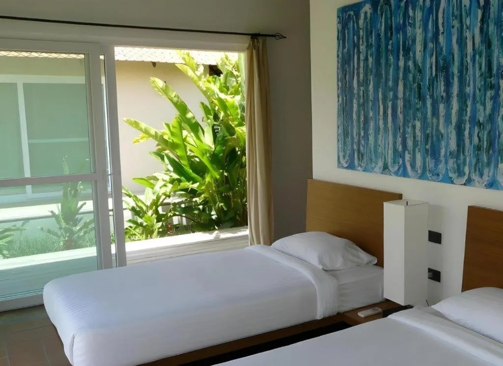 Bed in Lucerne Villa Resort