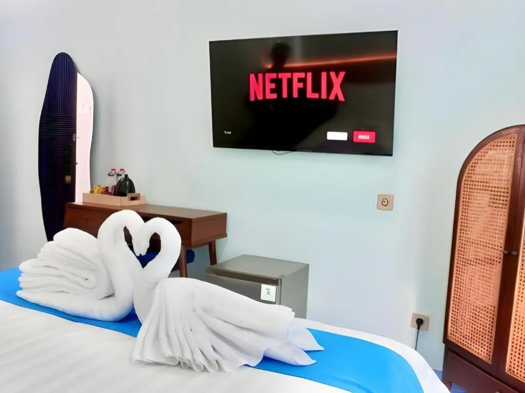 Bed in Grand Malioboro Yogyakarta