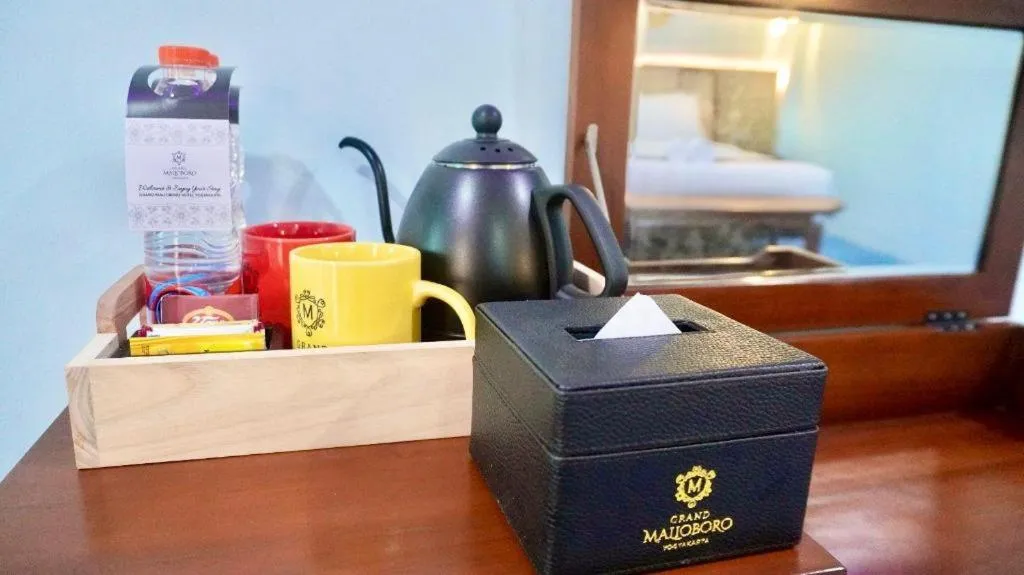 Bed in Grand Malioboro Yogyakarta