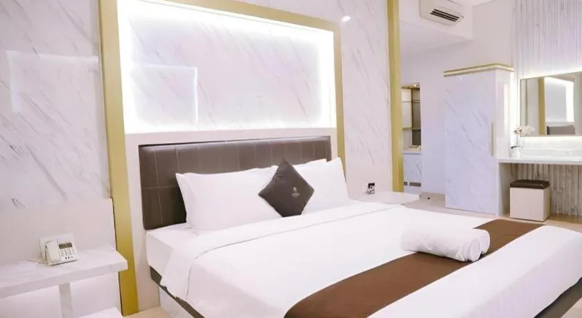 Bed in Grand Malioboro Yogyakarta