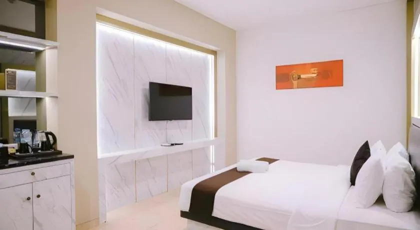 Bed in Grand Malioboro Yogyakarta