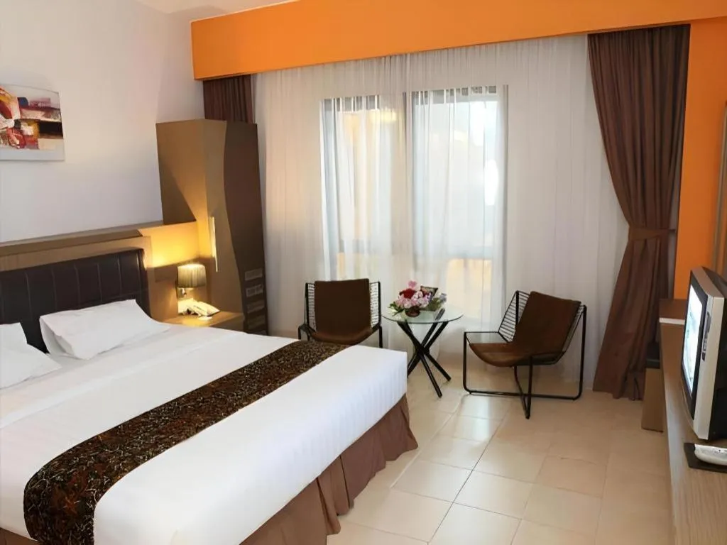 Bed in Grand Malioboro Yogyakarta