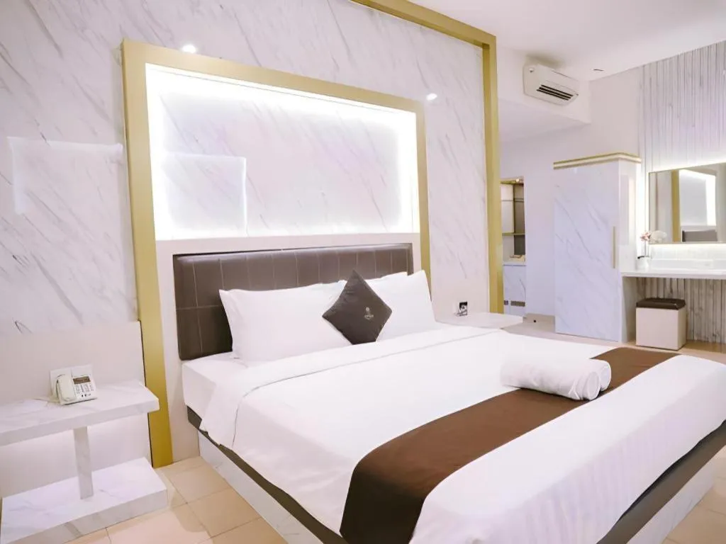 Bed in Grand Malioboro Yogyakarta