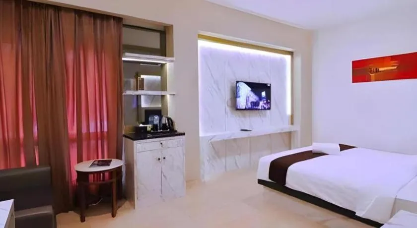 Bed in Grand Malioboro Yogyakarta