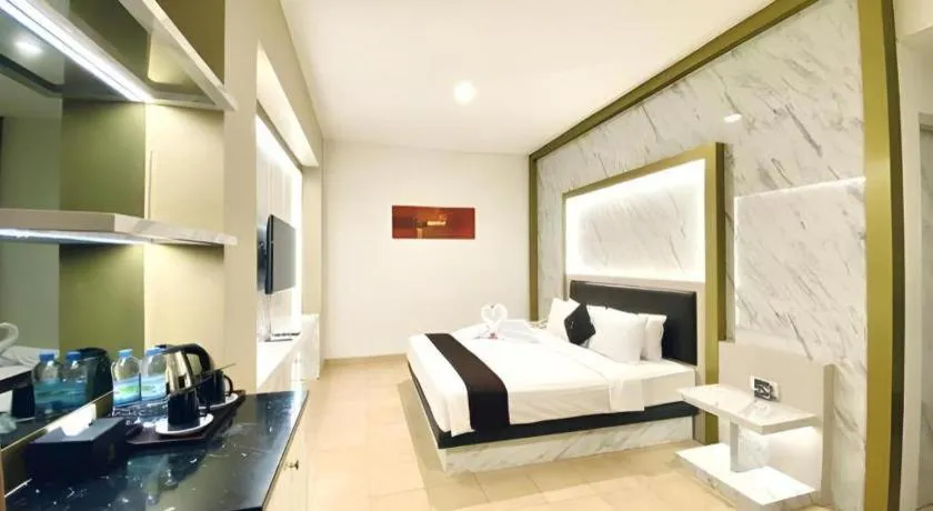 Bed in Grand Malioboro Yogyakarta