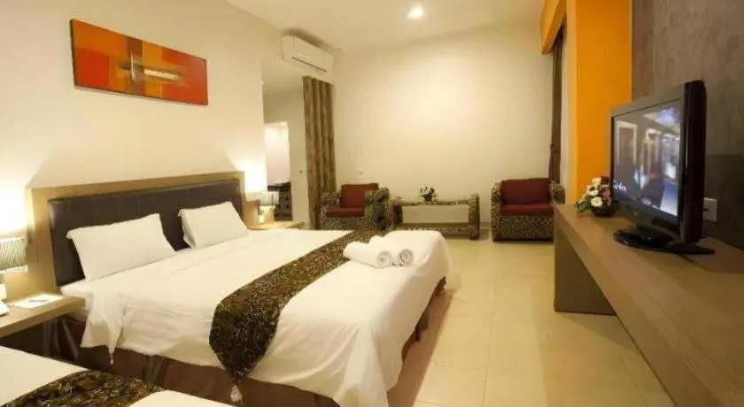 Bed in Grand Malioboro Yogyakarta