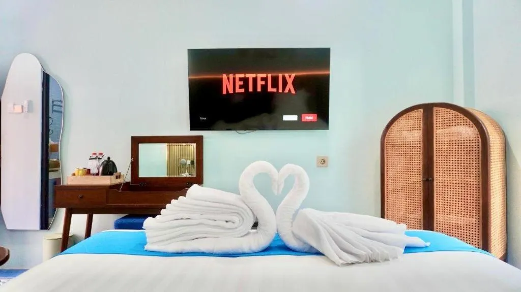 Bed in Grand Malioboro Yogyakarta