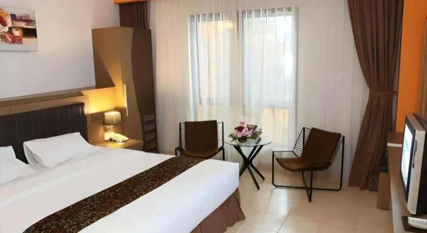 Bed in Grand Malioboro Yogyakarta