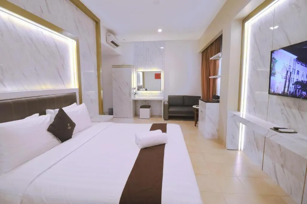 Bed in Grand Malioboro Yogyakarta